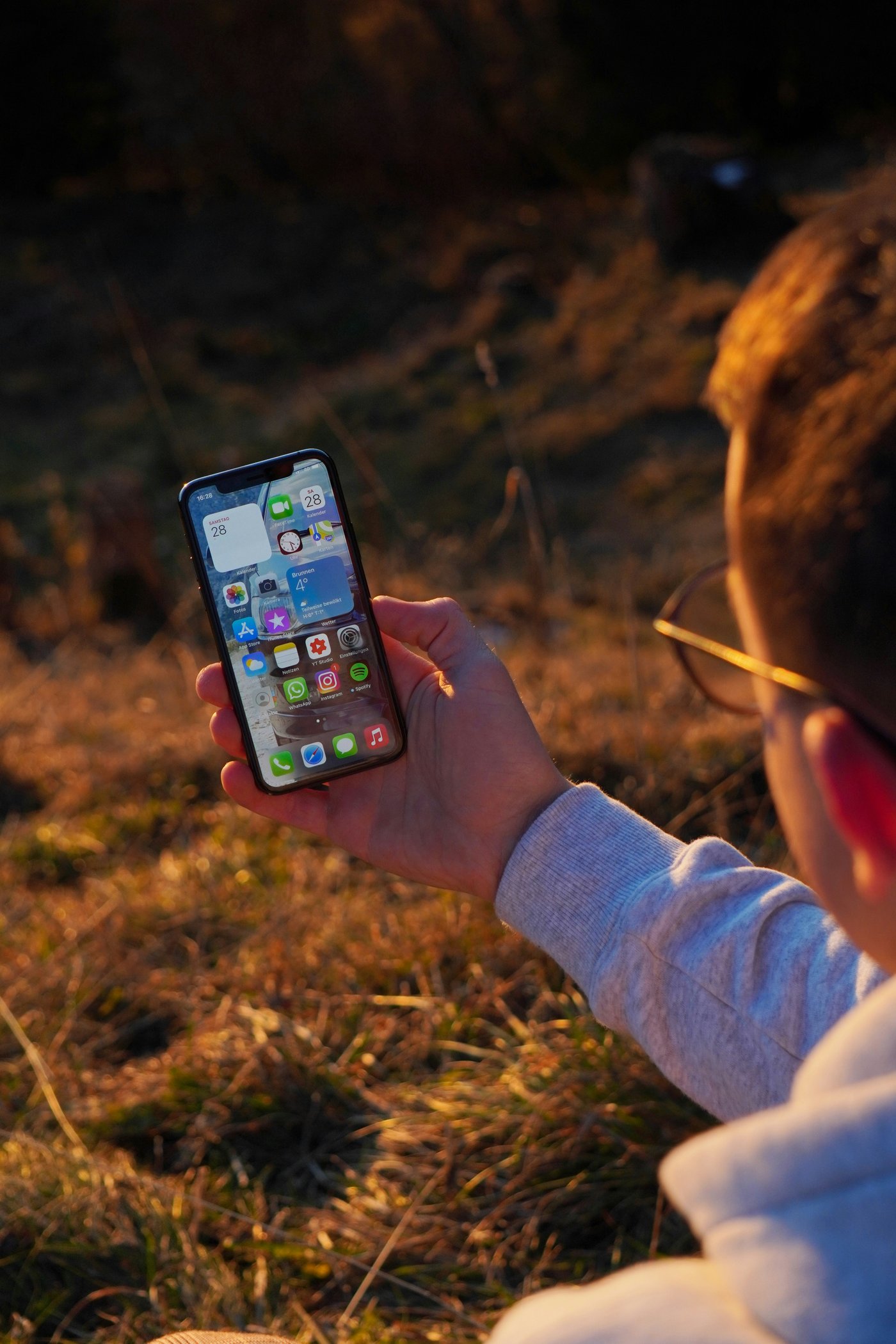 Someone absorbed in their phone, tuned out of the world around them